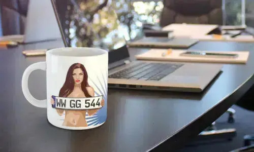 Sexy mug by a laptop