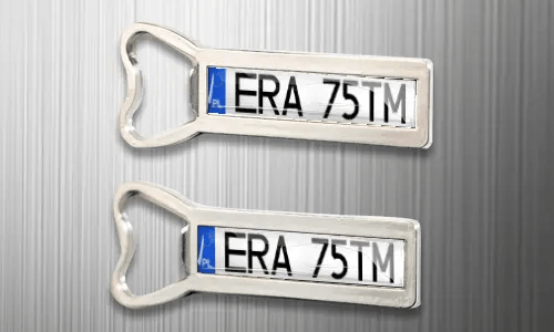 two magnet bottle openers on the fridge