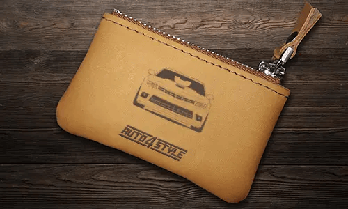 Brown leather key pouch with zipper, printed car and plate 
