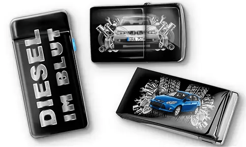 Three black car-themed lighters with metallic accents. One has 