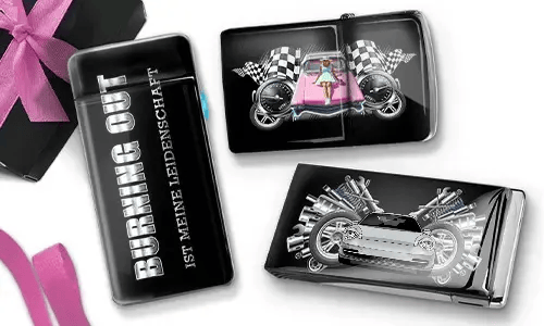 A decorative lighter and two cases featuring racing themes. One lighter reads 