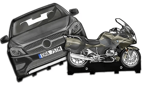 Cardboard cutouts of a black car and metallic motorcycle on stands, used for display or training