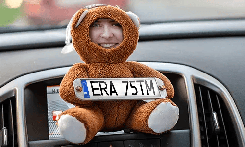 Cuddly toy with photo in the car Cuddly toy with photo in the car