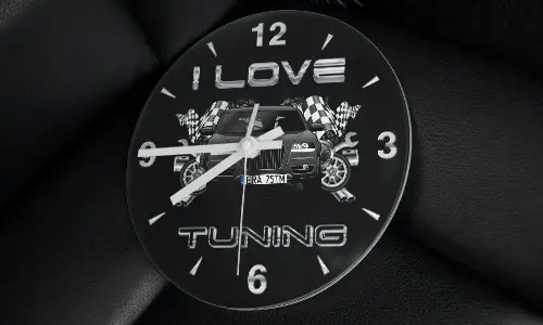 Wall clock with modified car, racing flags, wheels, and I LOVE TUNING text on black background